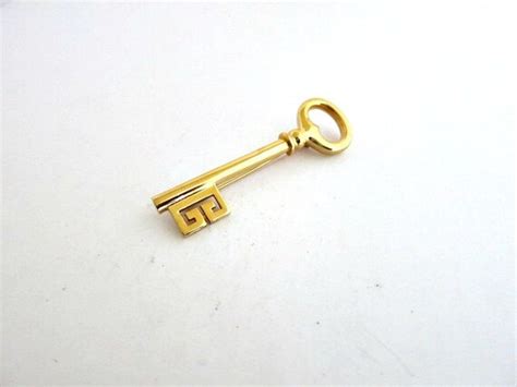 Vintage, 1977 GIVENCHY pin, GOLD TONE SKELETON KEY 